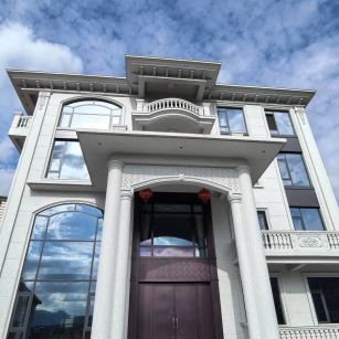 晋中白麻别墅外墙干挂石材效果示例