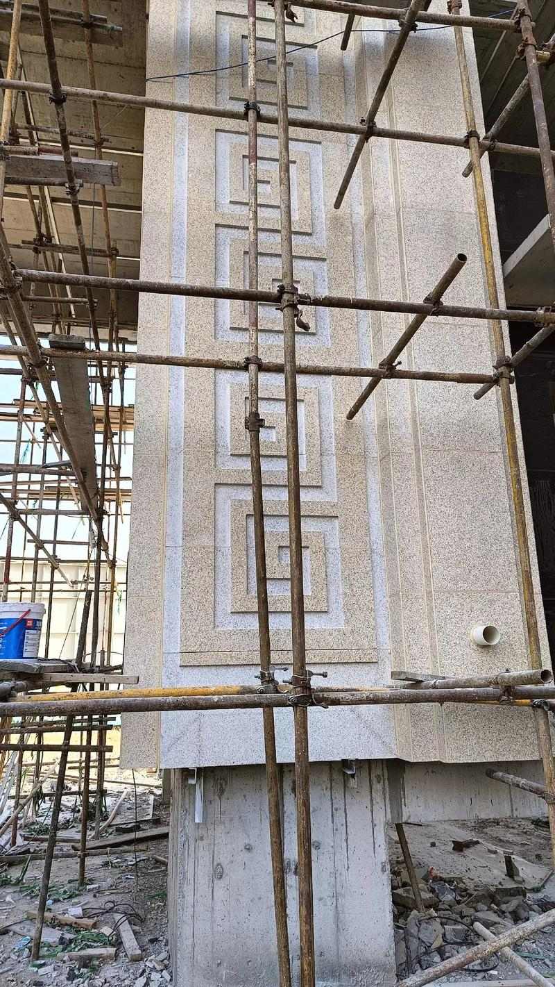 晋中 黄金麻花岗岩别墅外墙干挂回纹造型效果