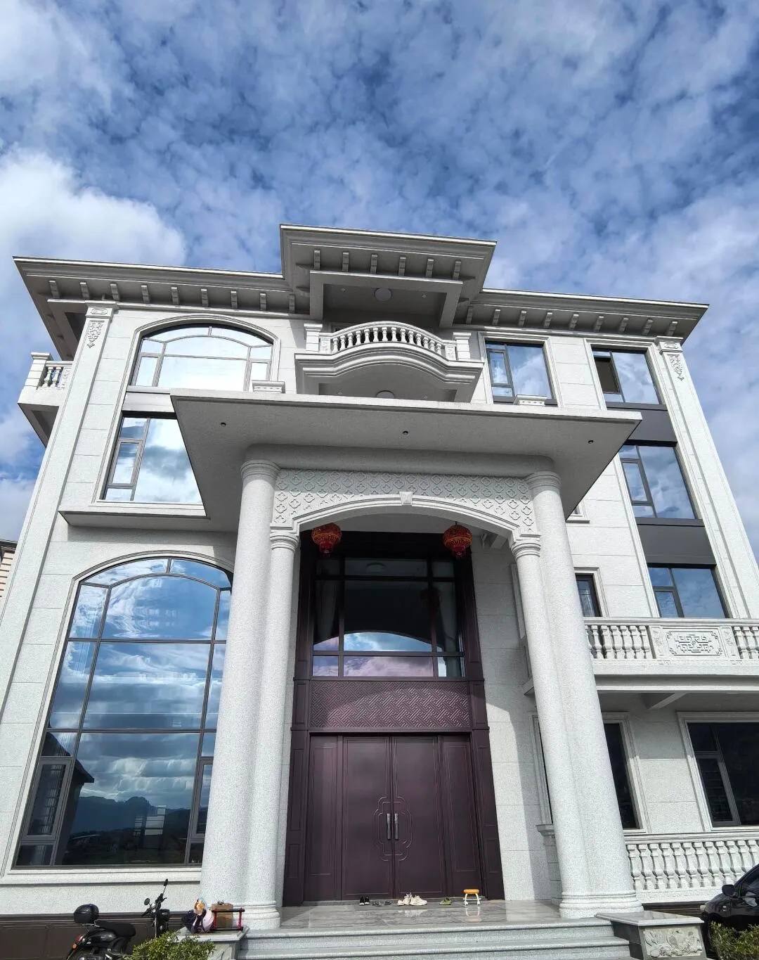 晋中白麻别墅外墙干挂石材效果示例